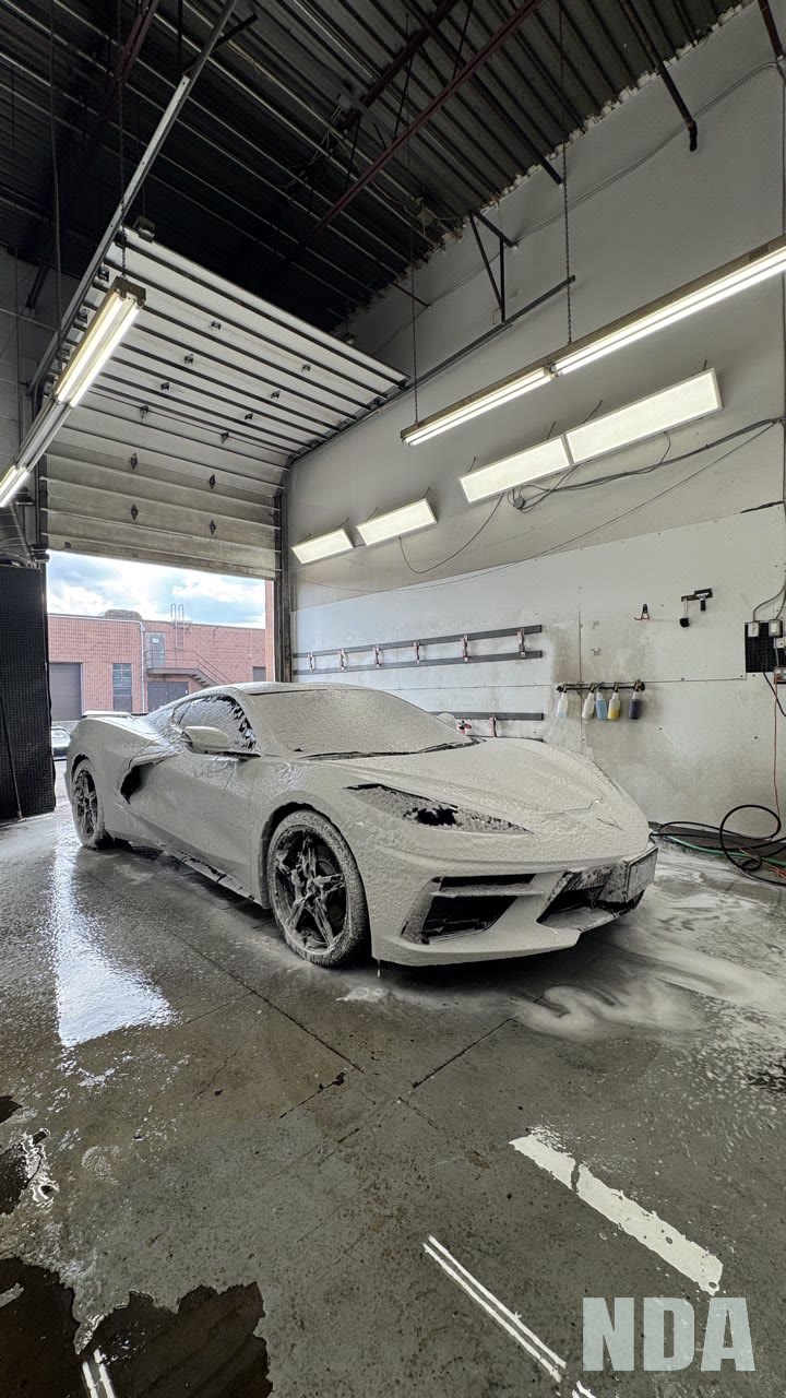 Under a full coat of snow foam, Chevrolet Corvette Stingray