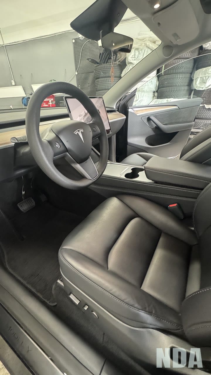 Detailed interior of a black Tesla Model Y