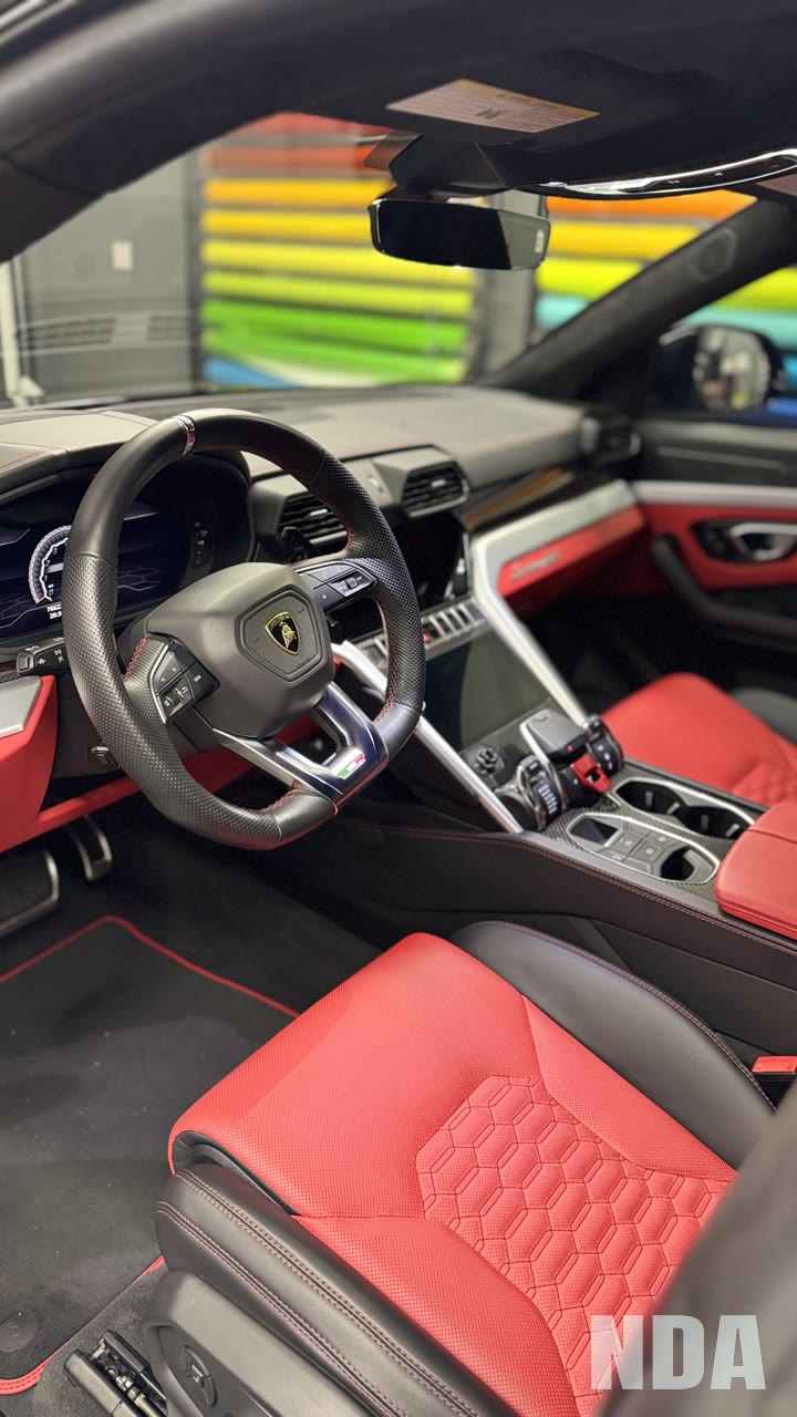 Detailed interior of a black Lamborghini Urus
