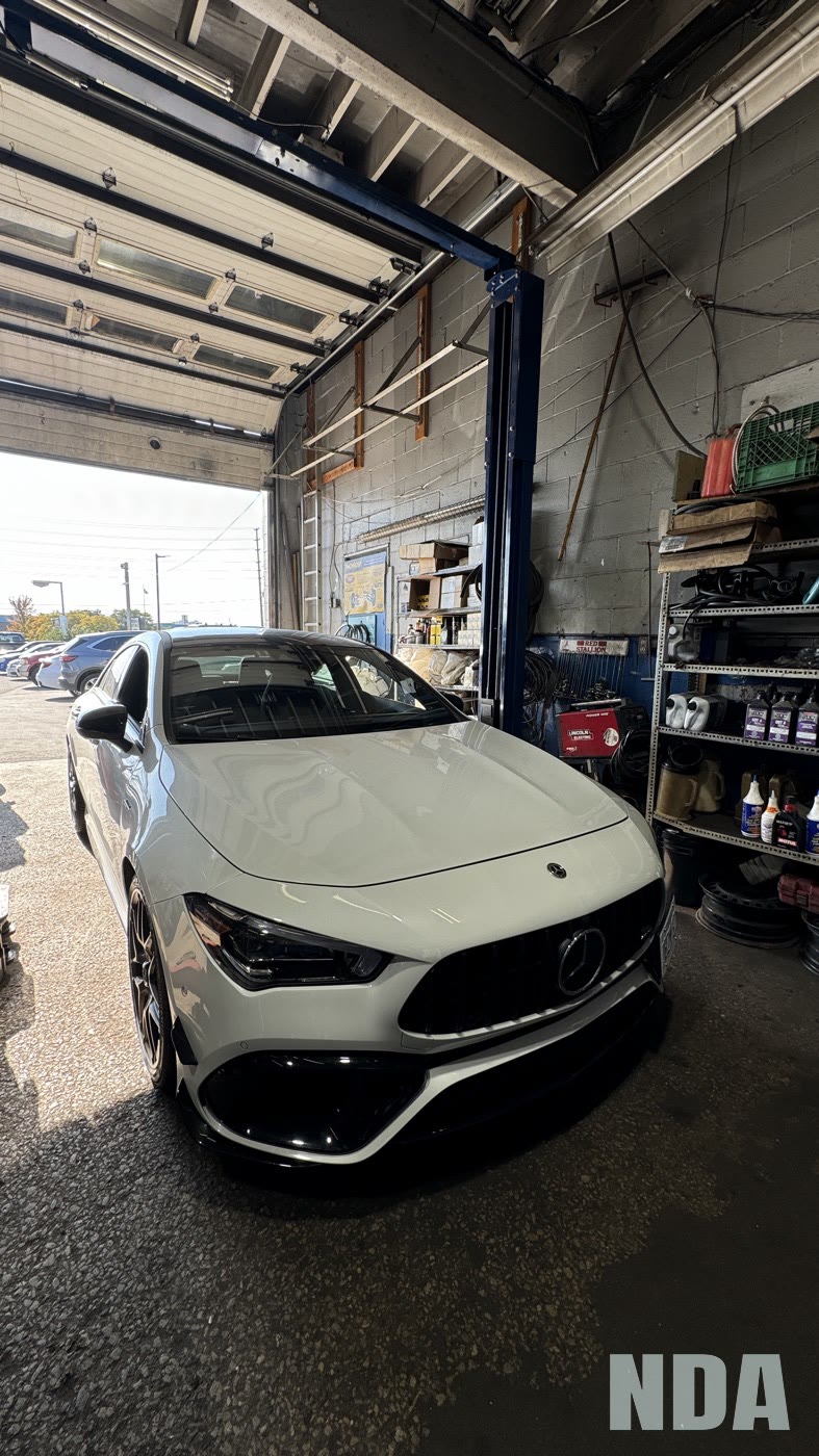 white Mercedes-AMG CLA